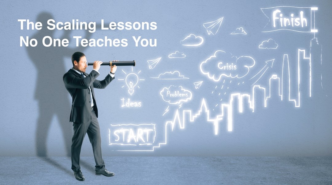 Attractive young european businessman with spyglass standing on concrete wall background with creative business sketch. Success, marketing, future and idea concept